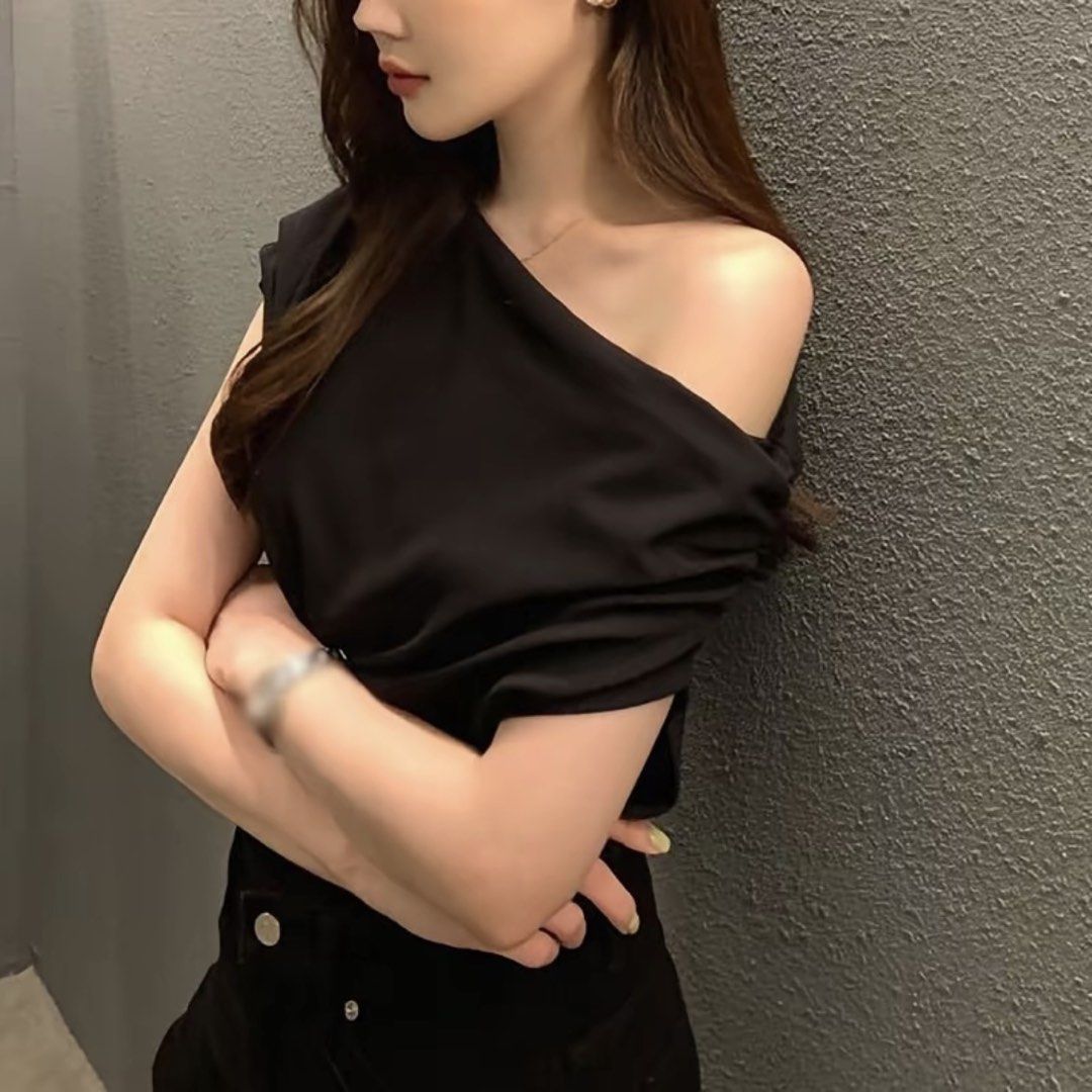 Black One-Shoulder Asymmetrical Top (Category: Sleeveless) located in Paranaque City. Submitted by gabbisells (Listing ID 1469552749, Image 1). Description: Message for more photos!.