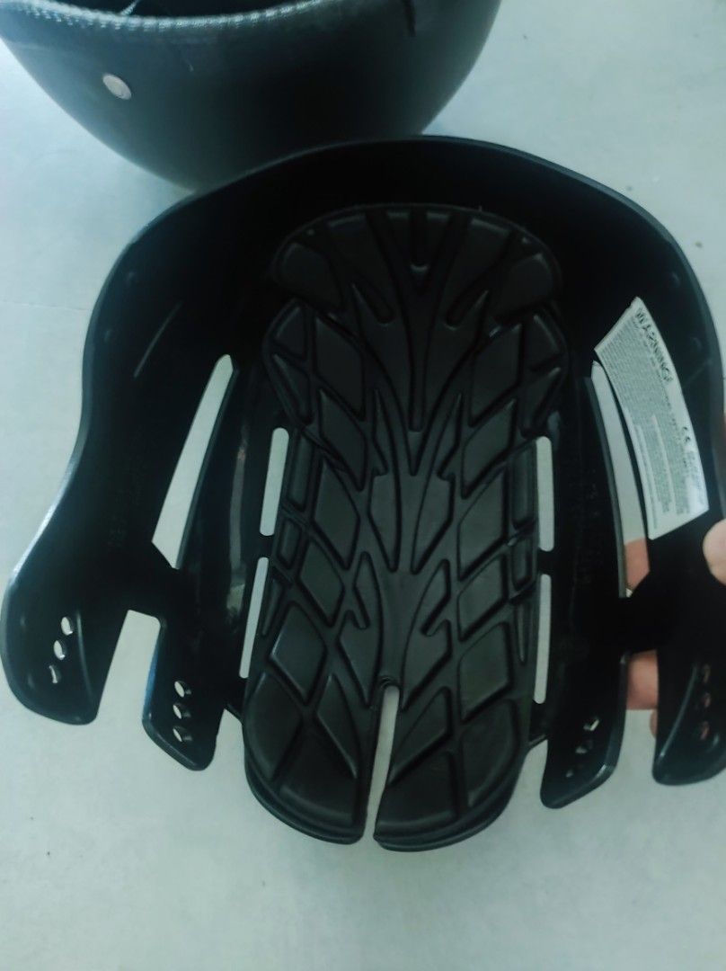 Black Protective Helmet Liner with Tread Pattern Padding (Category: Caps & Hats) located in Pasay City. Submitted by wizemindz138970 (Listing ID 1469426185, Image 3). Description: - Hard plastic outer shell for reliable protection - Molded interior padding with textured tread for grip and comfort - Adjustable side straps for a secure fit - Built-in ventilation slots to keep you cool - Glossy finish with a clean surface fits inside any baseball ca