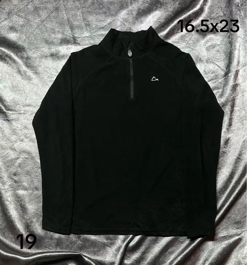 Black Quarter Zip Pullover Long Sleeve Shirt (Category: Coats, Jackets and Outerwear) located in Cavite. Submitted by bellewii (Listing ID 1469446807, Image 1). Description: - Color: Black - Style: Long sleeve pullover with quarter-zip collar - Detail: Small white logo hit on the chest - Fit/Size (Flat measurements): Width ~16.5 inches, Length ~23 inches - Material: Lightweight and comfortable - Best for: Workouts or casual everyday wear.