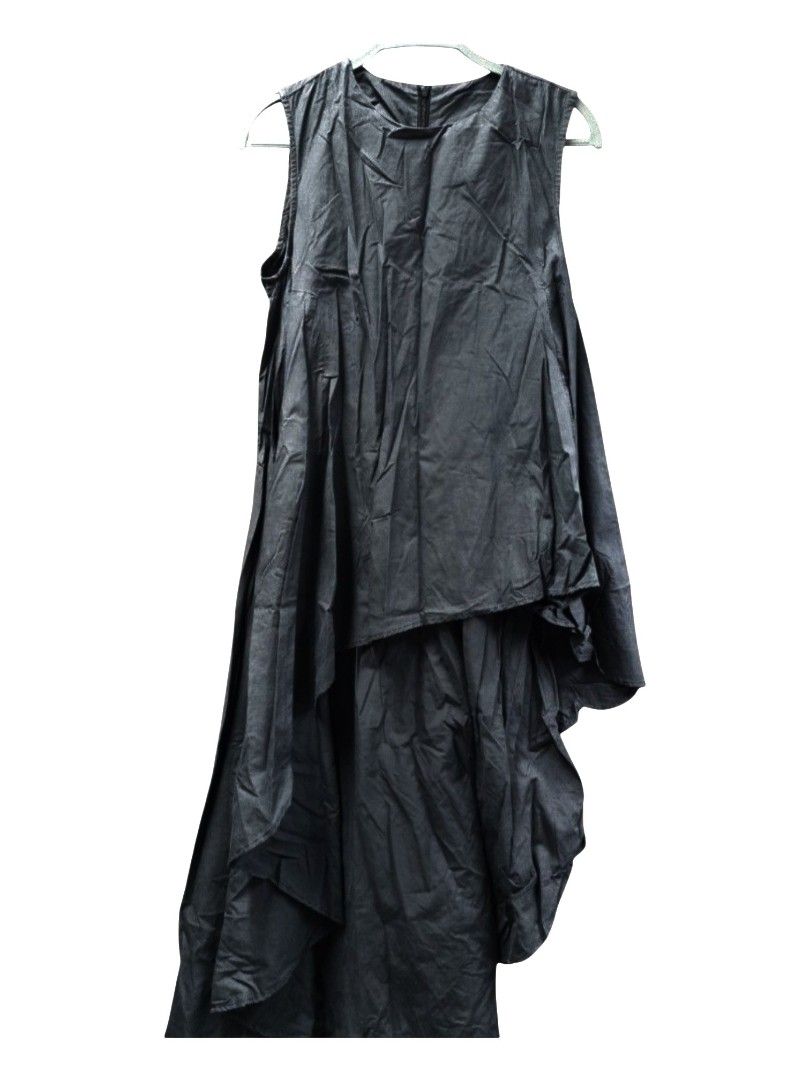 Black sleeveless asymmetrical long top (Category: Others Tops) located in Quezon City. Submitted by kcobs (Listing ID 1469461057, Image 1). Description: - Color: Black - Length: Midi - Cut: Sleeveless with a round neckline uneven length top - Design: Asymmetrical layered hem with heavy drapes and flowing movement - Fabric: Lightweight with natural wrinkles throughout - Style: Dramatic silhouette and gothic drape design - used only once ,condition