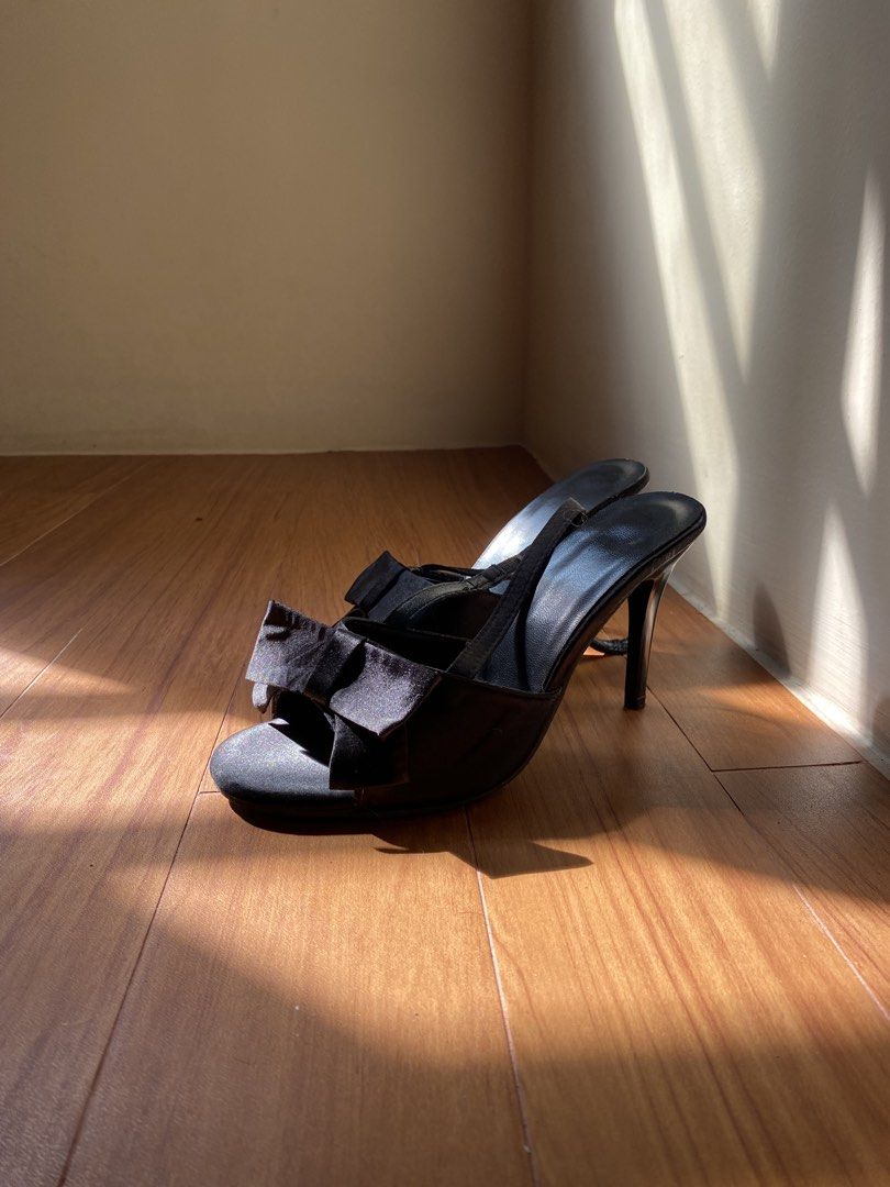 Black Stiletto Heels with Bow Detail (Category: Heels) located in General Trias. Submitted by rarekibae (Listing ID 1469396782, Image 2). Description: - Color & Material: Elegant black satin - Style: High-heeled stiletto with an open toe - Details: Adorable front bow and a secure slingback strap with a buckle - Occasion: Ideal for parties, romantic dinners, and dressy nights out - Condition: Brand new / Excellent quality.