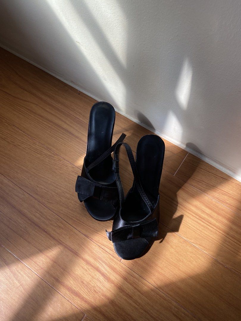 Black Stiletto Heels with Bow Detail (Category: Heels) located in General Trias. Submitted by rarekibae (Listing ID 1469396782, Image 3). Description: - Color & Material: Elegant black satin - Style: High-heeled stiletto with an open toe - Details: Adorable front bow and a secure slingback strap with a buckle - Occasion: Ideal for parties, romantic dinners, and dressy nights out - Condition: Brand new / Excellent quality.