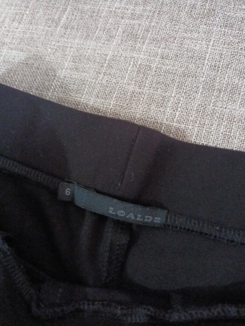Black stretch pants trousers (Category: Jeans) located in Quezon. Submitted by ja8720 (Listing ID 1469472159, Image 2). Description: - Color: Solid Black - Style: Slip-on with elastic waistband for all-day comfort - Design: Faux front pockets for a sleek, clean look - Material: Stretchy fabric that moves easily with you - Versatility: Great basic piece for daily wear or casual outings.