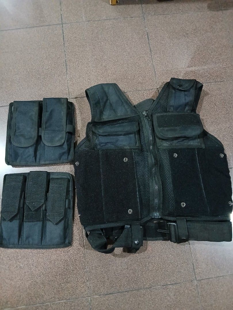 Black Tactical Vest with Adjustable Straps and Pouches (Category: Other Sports Equipment and Supplies) located in Dasmarinas. Submitted by tataysgarage (Listing ID 1469426809, Image 2). Description: Black Tactical Vest / Load-Bearing Rig (Airsoft, Fishing, Outdoor) – As-Is ​Description: Minimal used black tactical mesh vest with adjustable side laces, removable front modular pouches, and double back pockets. Breathable, durable, and fully functio