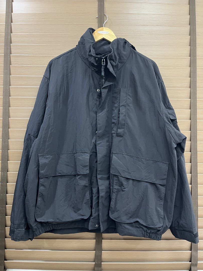 Black Utility Cargo Jacket with Multiple Pockets (Category: Coats, Jackets and Outerwear) located in Mabalacat. Submitted by fashionclothesph (Listing ID 1469512294, Image 1). Description: Black lightweight utility jacket with multiple pockets, high collar, zip and button closure, and adjustable fit. Perfect for layering..