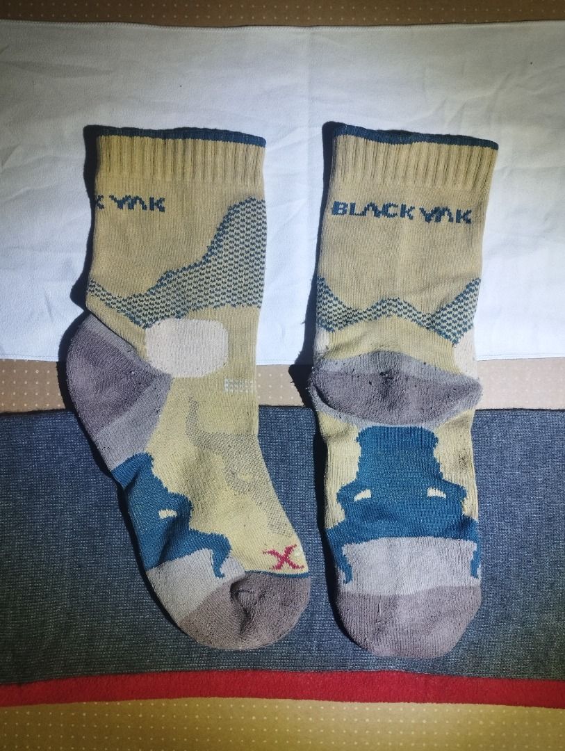 Black Yak Outdoor Socks (Category: Socks) located in Caloocan City. Submitted by jrdar (Listing ID 1469566801, Image 1). Description: - Authentic Black Yak outdoor socks - Color: Beige and blue - X-Static technology for advanced freshness and odor control - Features a stylish bull graphic and brand logo - Textured knit panels on heel and toe for extra cushioning during hikes - Ribbed cuffs for a secure, stay-put fit - Ideal for hiking, camping, a