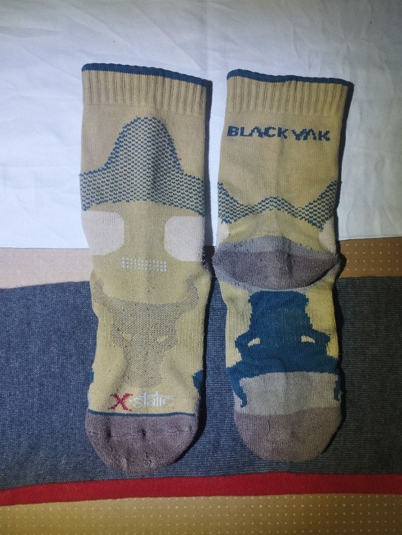 Black Yak Outdoor Socks (Category: Socks) located in Caloocan City. Submitted by jrdar (Listing ID 1469566801, Image 2). Description: - Authentic Black Yak outdoor socks - Color: Beige and blue - X-Static technology for advanced freshness and odor control - Features a stylish bull graphic and brand logo - Textured knit panels on heel and toe for extra cushioning during hikes - Ribbed cuffs for a secure, stay-put fit - Ideal for hiking, camping, a