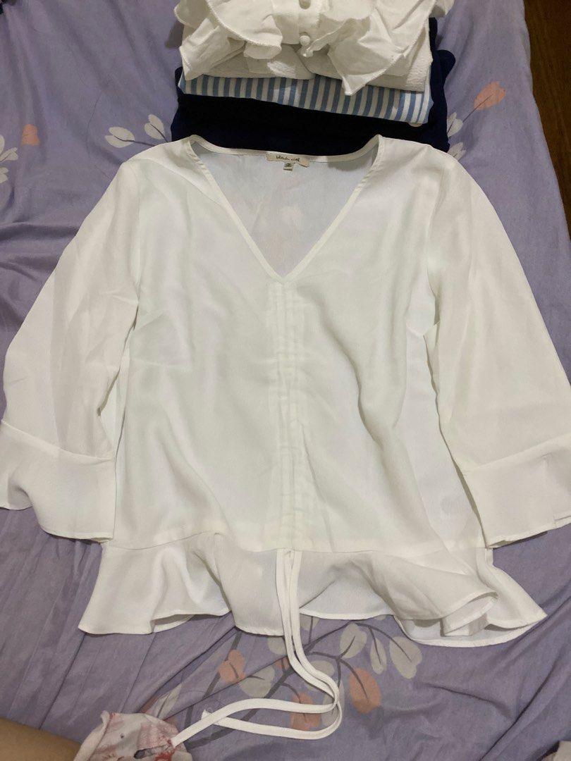Bleu Ciel White V-Neck Blouse Size M (Category: Blouses) located in Pasig City. Submitted by alaineeeee (Listing ID 1469513224, Image 1). Description: - Brand: Bleu Ciel - Size: Medium - Color: White - Style: V-neck with flared sleeves and peplum hem - Details: Adjustable front drawstring and ties - Material: Light and flowy fabric - Origin: Made in Vietnam - Versatile: Great for casual outings or office wear.