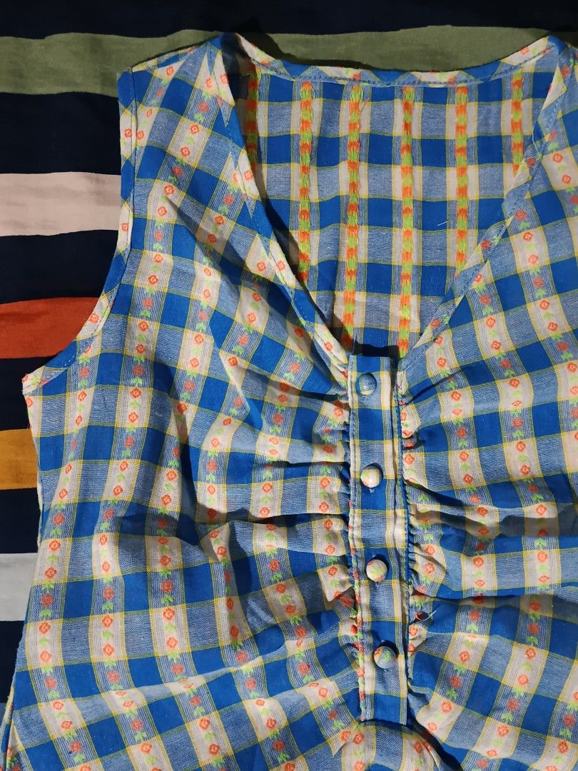 Blue Plaid Peplum Sleeveless Blouse Top (Category: Sleeveless) located in Pasay City. Submitted by angeldollx (Listing ID 1469484964, Image 3). Description: 💮 Blue and white plaid with cute mini floral prints inside the grid 💮 THIN and lightweight fabric 💮 Small - Medium 💮 NO FLAWS!.