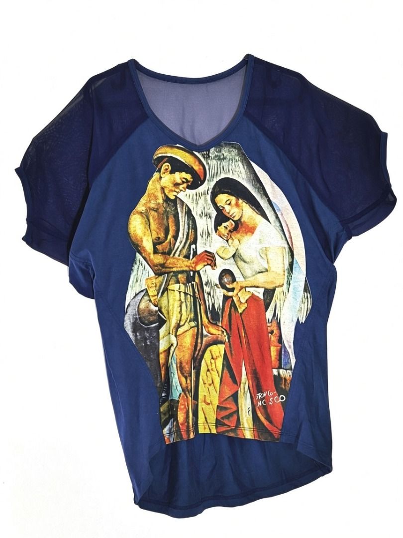 Blue T-shirt with Art Print (Category: Tshirts & Polo Shirts ) located in Pasig City. Submitted by elegantdress (Listing ID 1469234600, Image 1). Description: - Color: Blue - Material: Lightweight, breathable cotton-blend - Design: Features a large graphic print of traditional Filipino artwork on the front - Fit: Relaxed fit with a slightly curved back hem - Ideal for: Casual daily wear and art enthusiasts.