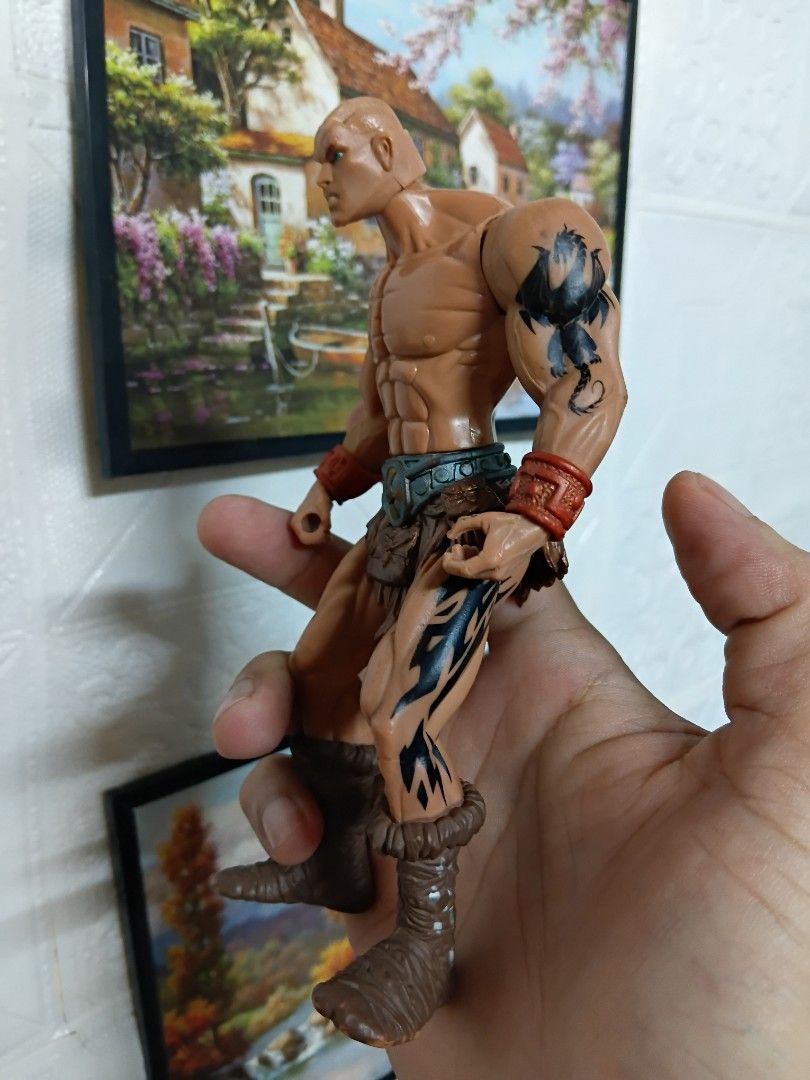 Bootleg He Man (Category: Figurines & Statues) located in Quezon City. Submitted by coffeeyuki56158 (Listing ID 1469427072, Image 2). Description: Bootleg He Man walang hair po and mga armors , axe and sword , based on my research this is high quality bootleg chap mei brand kahit nakalagay sa ilalam ng paa is mattel brand obviously bootleg pero gayang gaya yung mold sa original 200x series na MOTU , presentable pa naman po at may tattoo bwisit na
