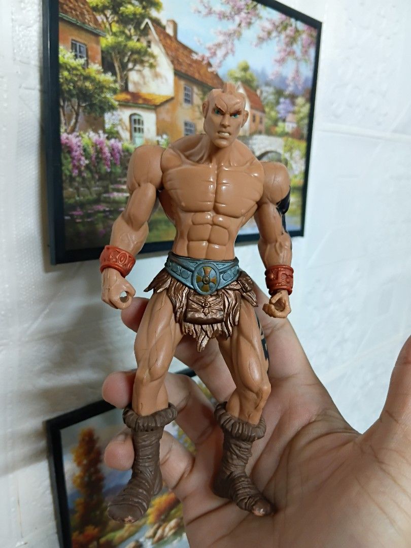 Bootleg He Man (Category: Figurines & Statues) located in Quezon City. Submitted by coffeeyuki56158 (Listing ID 1469427072, Image 1). Description: Bootleg He Man walang hair po and mga armors , axe and sword , based on my research this is high quality bootleg chap mei brand kahit nakalagay sa ilalam ng paa is mattel brand obviously bootleg pero gayang gaya yung mold sa original 200x series na MOTU , presentable pa naman po at may tattoo bwisit na