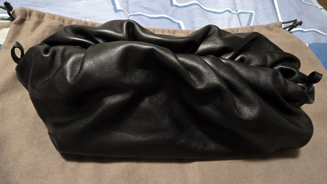 Bottega Veneta The Chain Pouch (Category: Luxury Bags & Wallets) located in Las Pinas. Submitted by insouciant_worrier (Listing ID 1469557596, Image 1). Description: Authentic Bottega Veneta With Entrupy Inclusions: dust bag, authenticity cards Flaws: no chain, and the part where you attach the chain got snagged. SELLING LOW Reason: the chain was removed — but it is functional as a clutch. .
