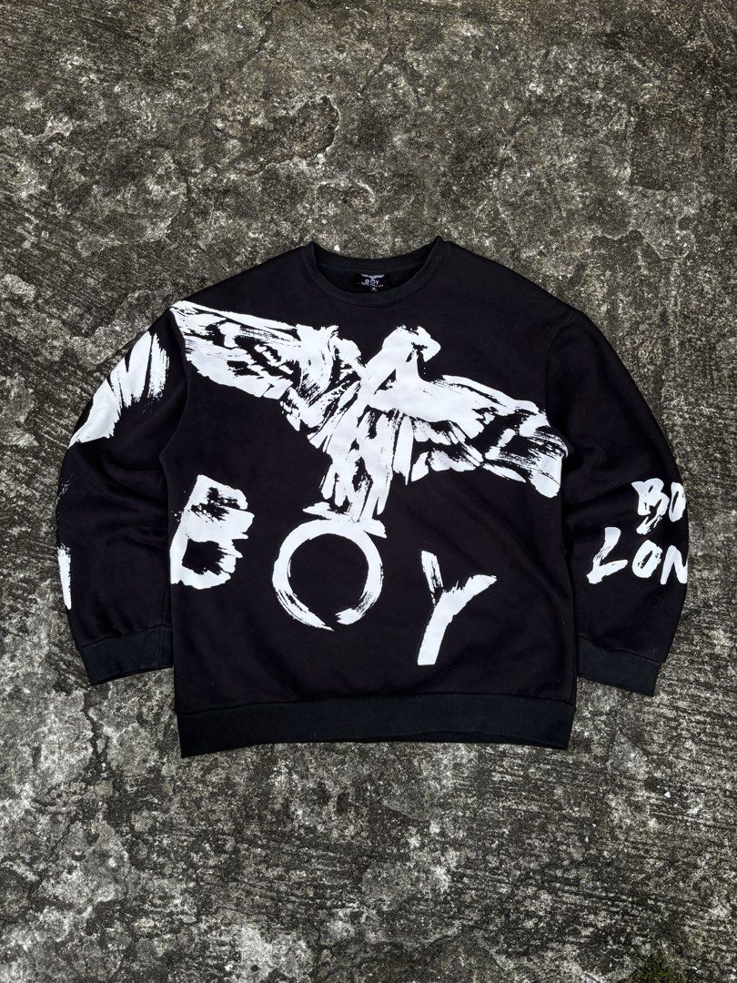 BOY London Black Paint Splatter Eagle Sweatshirt (Category: Coats, Jackets and Outerwear) located in Caloocan City. Submitted by neweagle-424b (Listing ID 1469540895, Image 1). Description: best fit xl to 2xl W 24 x 27 L - Brand: Boy London - Style: Crewneck Sweatshirt - Color: Black - Size: XL (Relaxed Fit) - Design: Iconic brushstroke eagle graphic on chest with bold white lettering on sleeves - Interior: Soft fleece lining for warmth and comfo