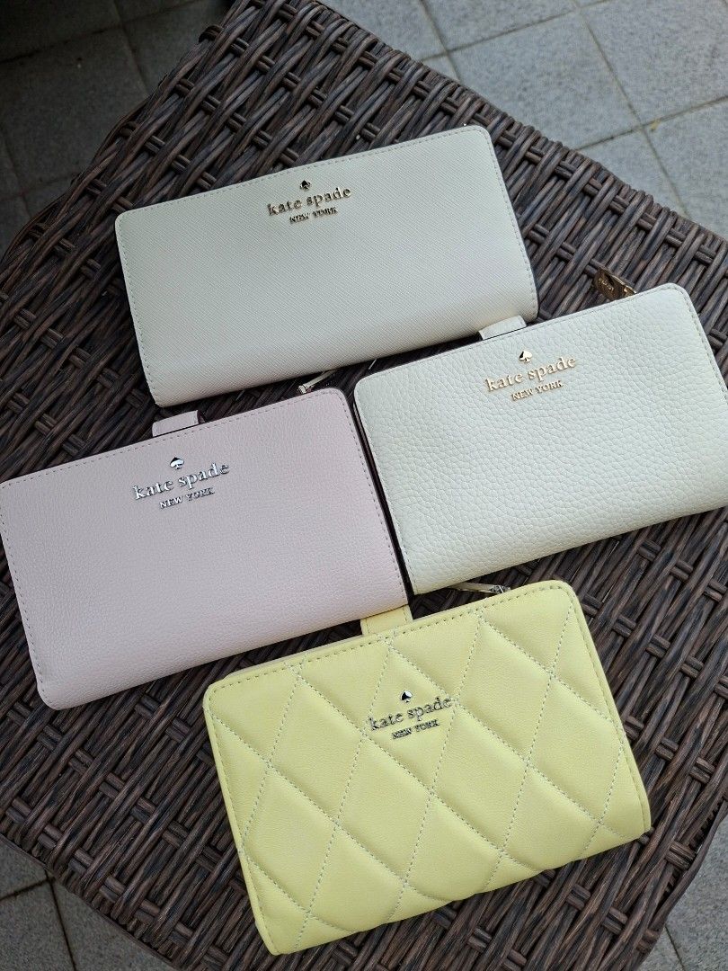 BRANDNEW KATE SPADE BI-FOLD WALLETS (Category: Wallets & Card holders) located in Antipolo. Submitted by cloudpetals.01 (Listing ID 1469490877, Image 1). Description: Payment before shipping or upon confirmed pick-up by lalamove rider..