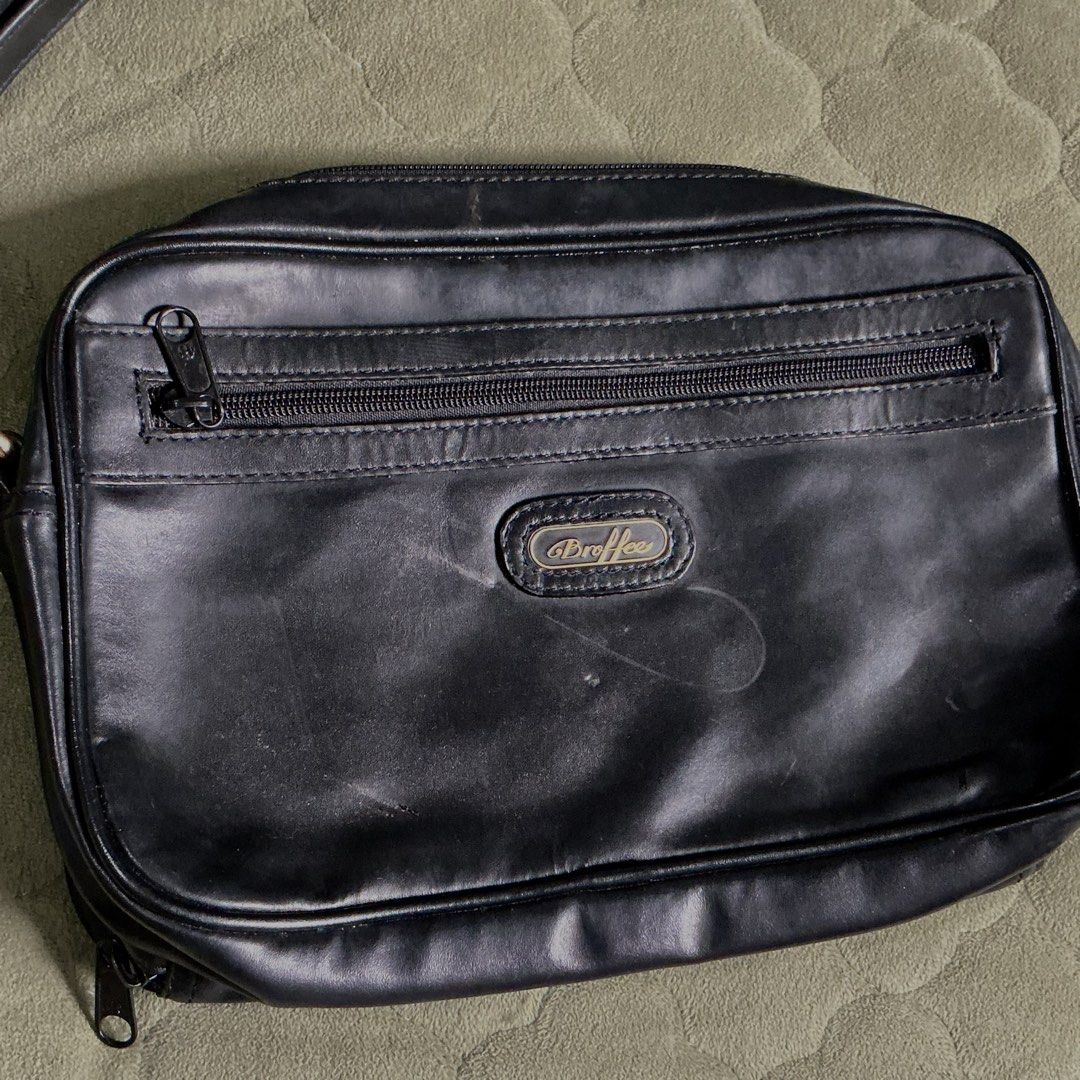 Broffee clutch bag genuine leather (Category: Belt bags, Clutches and Pouches) located in Angeles City. Submitted by goodbuysathome (Listing ID 1469404635, Image 2). Description: Broffee genuine leather clutch bag for men dual zip lots of compartments Add Sf 74 Gcash payment Lp.