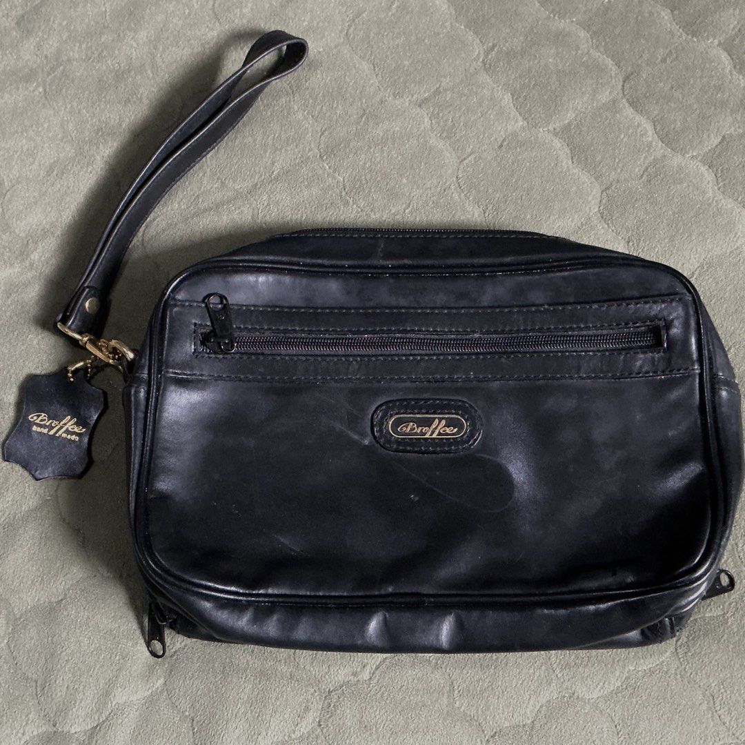 Broffee clutch bag genuine leather (Category: Belt bags, Clutches and Pouches) located in Angeles City. Submitted by goodbuysathome (Listing ID 1469404635, Image 1). Description: Broffee genuine leather clutch bag for men dual zip lots of compartments Add Sf 74 Gcash payment Lp.