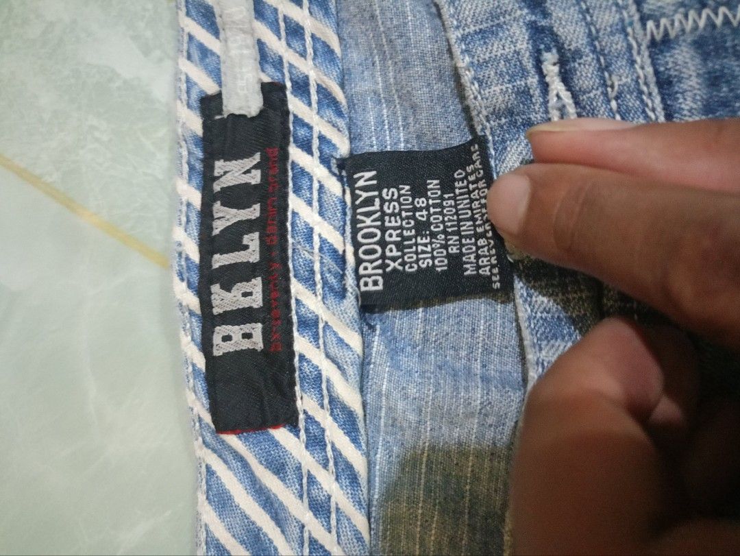 Brooklyn Xpress Denim Shorts Size 48 (Category: Shorts) located in General Mariano Alvarez. Submitted by markaj1699 (Listing ID 1469428524, Image 2). Description: - Brand: Brooklyn Xpress - Size: 48 - Material: 100% Cotton - Color: Light blue wash - Fit: Relaxed fit streetwear piece - Details: Heavy distressing on front right leg, stylish striped inner waistband lining, multiple functional pockets, branded tag on coin pocket - Condition: Clean in