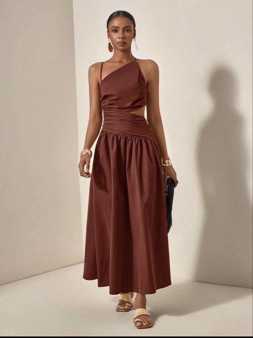 Brown Asymmetrical Backless Dress (Category: Dresses) located in Dinalupihan. Submitted by cjeleven (Listing ID 1469411140, Image 1). Description: PRE-LOVED DRESS FOR SALE 🛒 Selling this gorgeous dress! Only worn ONCE. Perfect for anyone looking for an elegant outfit for a special occasion. Details: Color: Chocolate Brown Style: Asymmetrical One-Shoulder Design: Fitted waist with flowy maxi skirt Back: Open back with adjustable tie straps Condit