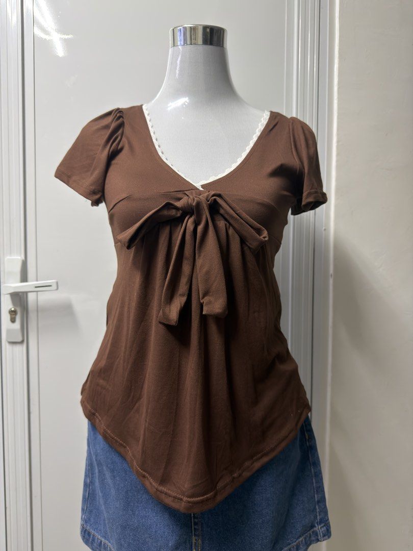 Brown Ribbon Top (Category: Blouses) located in Manila. Submitted by signatureessentialsph (Listing ID 1469557579, Image 1). Description: Brown Medium Dm if interested .