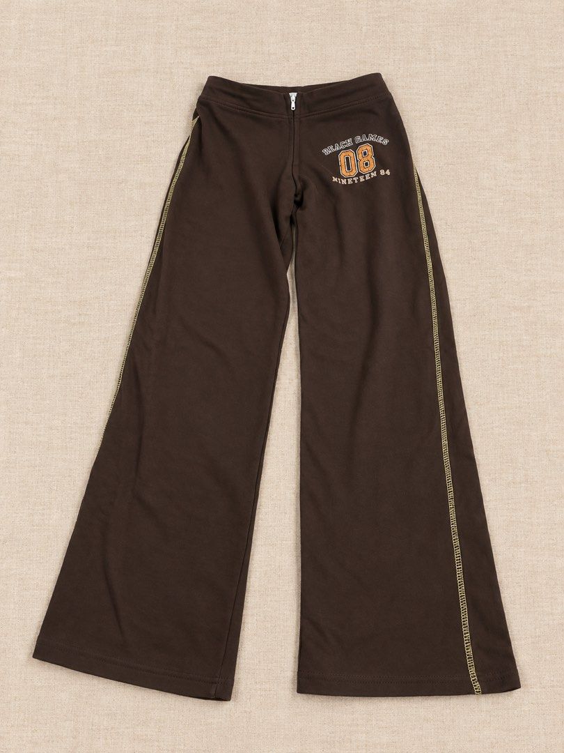 Brown Wide-Leg Pants with Graphic Print (Category: Other Bottoms) located in Manila. Submitted by lexiandco.ph (Listing ID 1469402718, Image 1). Description: .