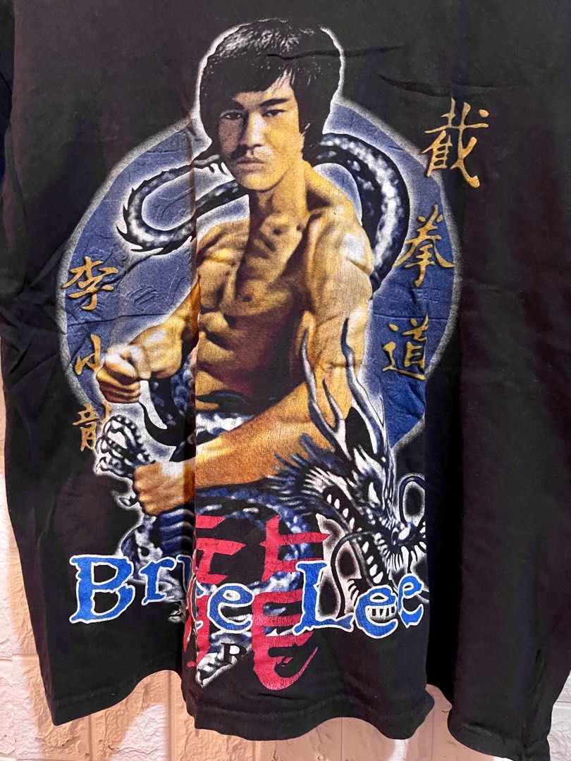 Bruce Lee Graphic Tshirt (Category: Activewear) located in Manila. Submitted by brex_3108 (Listing ID 1469444420, Image 2). Description: 🐉 FOR SALE: BRUCE LEE GRAPHIC T-SHIRT 🥋 🔥 Classic martial arts legend design! Perfect for Bruce Lee fans, vintage tee collectors, and streetwear lovers. ✔️ Brand: Hanes ✔️ Size: Large (L) ✔️ Color: Black ✔️ Material: 100% Cotton ✔️ Bold Bruce Lee and dragon graphic print 📏 Actual Measurements: • Width (pit-t
