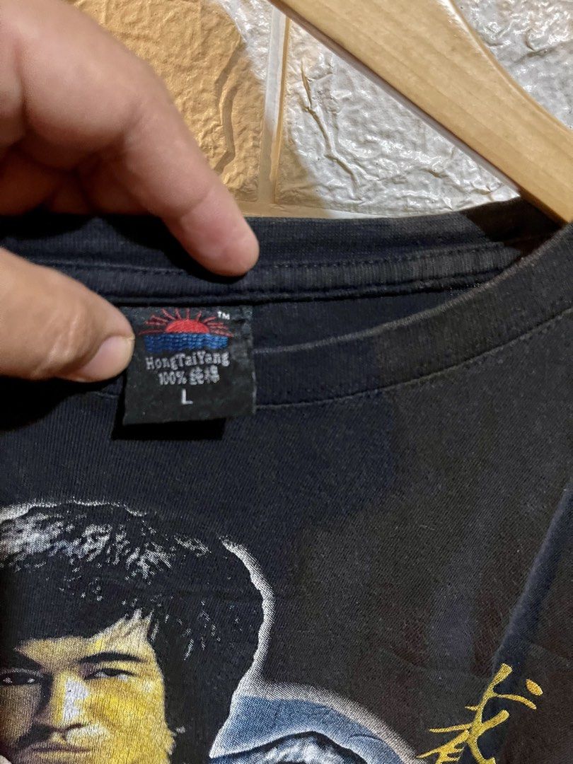 Bruce Lee Graphic Tshirt (Category: Activewear) located in Manila. Submitted by brex_3108 (Listing ID 1469444420, Image 3). Description: 🐉 FOR SALE: BRUCE LEE GRAPHIC T-SHIRT 🥋 🔥 Classic martial arts legend design! Perfect for Bruce Lee fans, vintage tee collectors, and streetwear lovers. ✔️ Brand: Hanes ✔️ Size: Large (L) ✔️ Color: Black ✔️ Material: 100% Cotton ✔️ Bold Bruce Lee and dragon graphic print 📏 Actual Measurements: • Width (pit-t