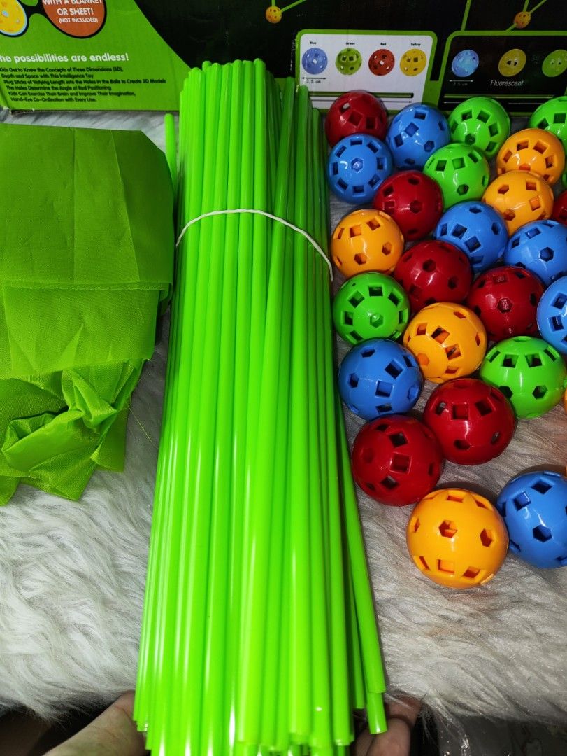 Build Your Own Den Magic Forts Glow (Category: Kids Toys) located in Cavite. Submitted by tinetaclesss (Listing ID 1469549084, Image 3). Description: - Kids building set for creating fun tents and forts - Ideal STEM toy for indoor and outdoor creative play - Includes green sticks, colorful connecting balls, and a green fabric cover sheet - Comes complete with an instruction manual and original box - Everything pictured in the bundle is included.