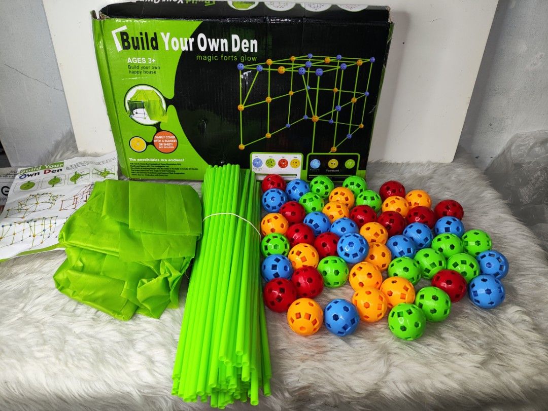 Build Your Own Den Magic Forts Glow (Category: Kids Toys) located in Cavite. Submitted by tinetaclesss (Listing ID 1469549084, Image 1). Description: - Kids building set for creating fun tents and forts - Ideal STEM toy for indoor and outdoor creative play - Includes green sticks, colorful connecting balls, and a green fabric cover sheet - Comes complete with an instruction manual and original box - Everything pictured in the bundle is included.