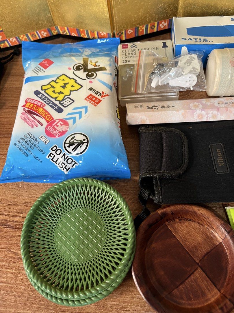 Bundle 5 Assorted Household Items Hardware and Accessories Bundle & More. (Category: Home Improvement Tools & Accessories) located in Gapan. Submitted by lunashop14 (Listing ID 1469419214, Image 2). Description: ₱100 take all Japan Message me - Miscellaneous drawer declutter bundle set - Includes Nikon pouch, wooden coasters, green plastic tray, window cleaning sheets, push pins, and utility tape - Features authentic Japanese packaging on select 