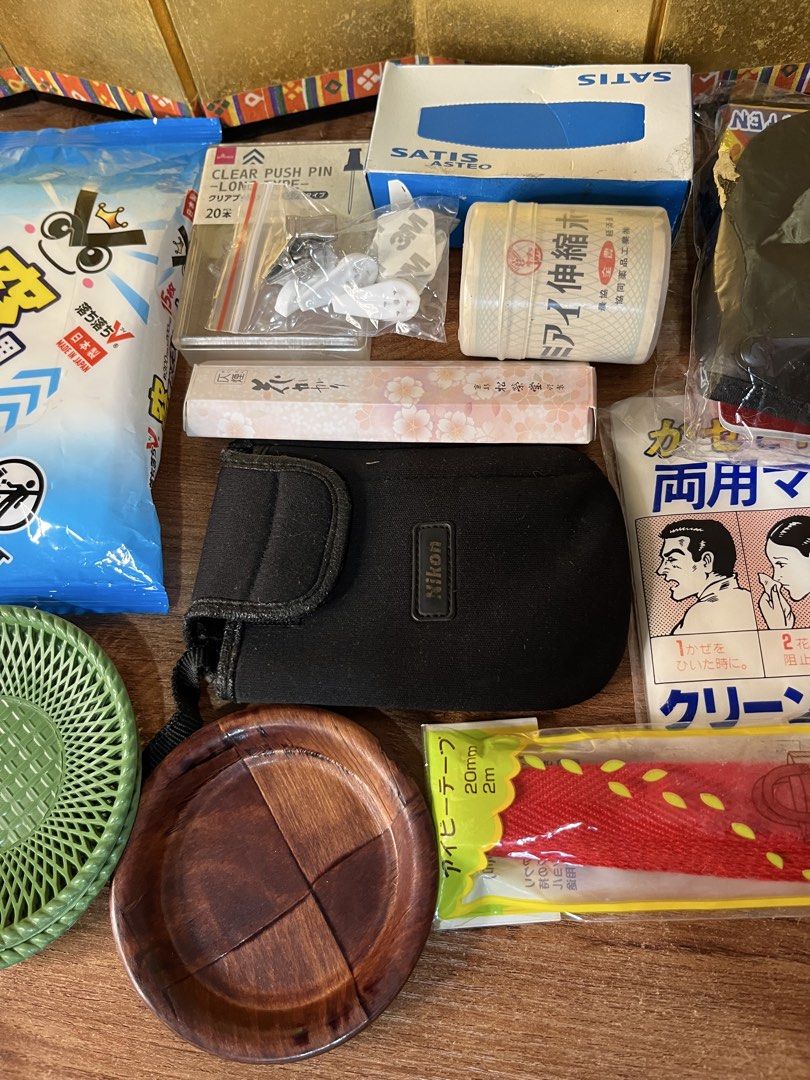 Bundle 5 Assorted Household Items Hardware and Accessories Bundle & More. (Category: Home Improvement Tools & Accessories) located in Gapan. Submitted by lunashop14 (Listing ID 1469419214, Image 3). Description: ₱100 take all Japan Message me - Miscellaneous drawer declutter bundle set - Includes Nikon pouch, wooden coasters, green plastic tray, window cleaning sheets, push pins, and utility tape - Features authentic Japanese packaging on select 