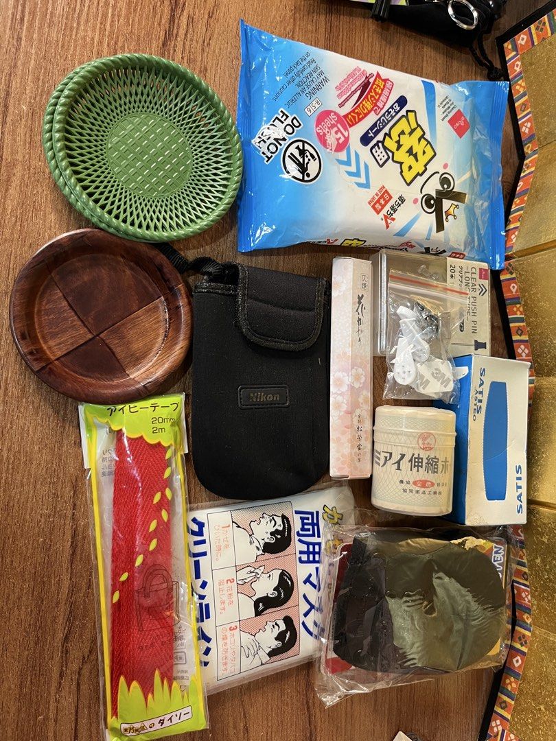 Bundle 5 Assorted Household Items Hardware and Accessories Bundle & More. (Category: Home Improvement Tools & Accessories) located in Gapan. Submitted by lunashop14 (Listing ID 1469419214, Image 1). Description: ₱100 take all Japan Message me - Miscellaneous drawer declutter bundle set - Includes Nikon pouch, wooden coasters, green plastic tray, window cleaning sheets, push pins, and utility tape - Features authentic Japanese packaging on select 