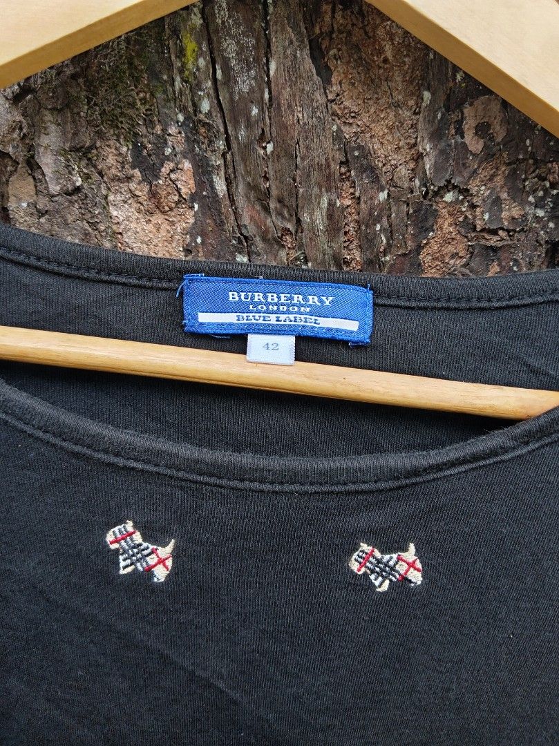 Burberry blue label (Category: Luxury Apparel) located in Malaybalay. Submitted by cjsv0228 (Listing ID 1469477024, Image 3). Description: Burberry tops blue level Size 42 on tag imbroid all logo As new no issue 680 shipp.