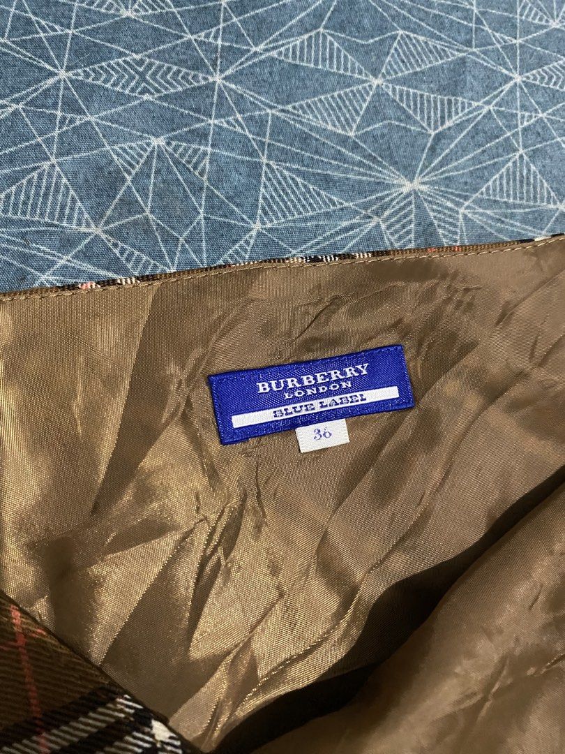 Burberry blue label skirt (Category: Skirts) located in Bato. Submitted by itsmethriftlist (Listing ID 1469544842, Image 2). Description: Asnew 36 on tag W28/21L.