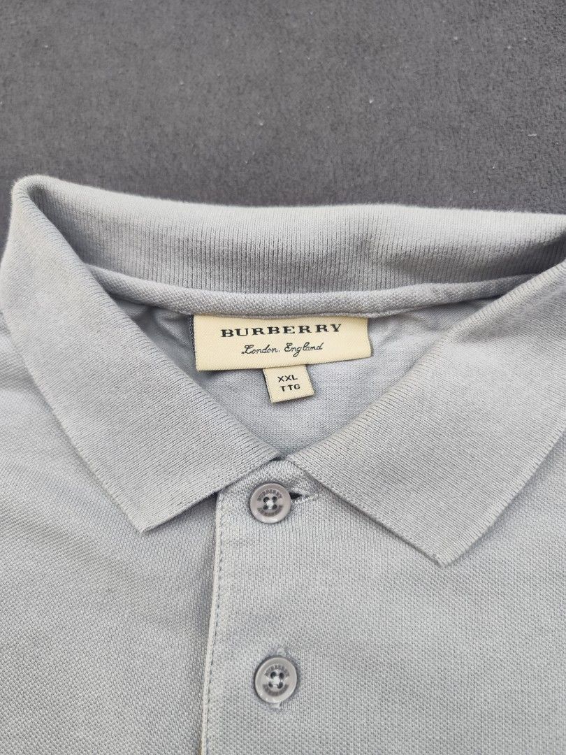 Burberry Polo Tee (Category: Luxury Apparel) located in Bulacan. Submitted by emilj23 (Listing ID 1469434584, Image 3). Description: Burberry Polo Tee Size XXL on tag L 29 W 23 Condition 9.5/10 Color rate 9.5/10 Issue Pinhole.