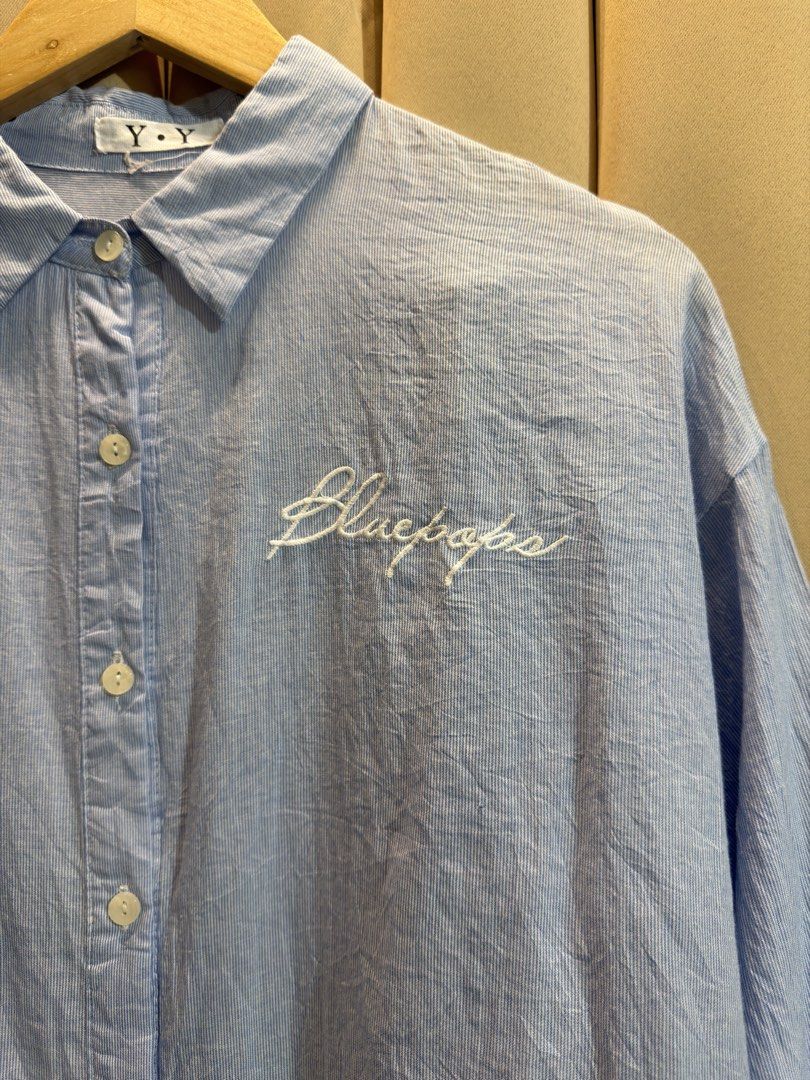 BUTTON-UP LONG SLEEVE SHIRT (Category: Longsleeves) located in Manila. Submitted by glamstylemnl (Listing ID 1469476808, Image 2). Description: ♡ SIZE: L-XL ♡ BUST: 45 ♡ Swipe left to see the actual color & details ♡ with white cursive embroidery on the left chest ♡ HQ • 10/10 ♡ Ready to wear 👚.