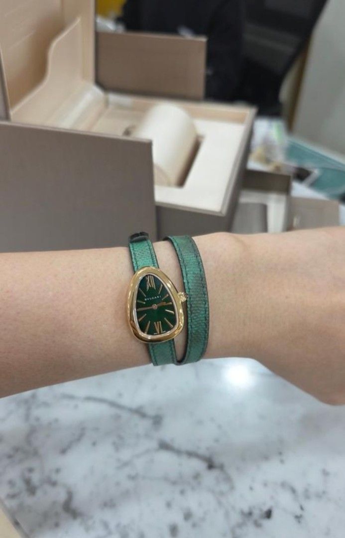 Bvlgari Serpenti leather strap watch (Category: Women's Watches) located in Quezon City. Submitted by jpnpia143 (Listing ID 1469491018, Image 1). Description: An statement piece from bvlgari serpenti collection in leather strap wrap around design. Its an 18 karat rosegold watch and has 2 strap in green and red strap that you can enjoy to change when your in the mood for colors. The watch comes almost complete inclusion box, warranty card, bracele