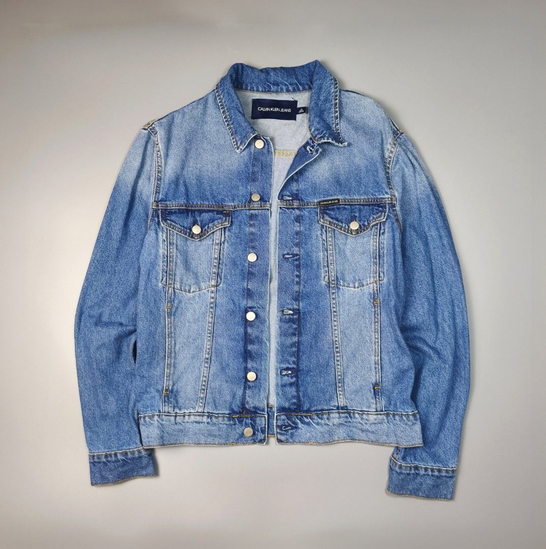 CALVIN KLEIN DENIM JACKET (Category: Coats, Jackets and Outerwear) located in Baguio. Submitted by nikholeisshop29 (Listing ID 1469556355, Image 1). Description: CALVIN KLEIN DENIM JACKET 1,880 + SF L on tag L:26 | W:20 Good as new condition Color rate:10/10.