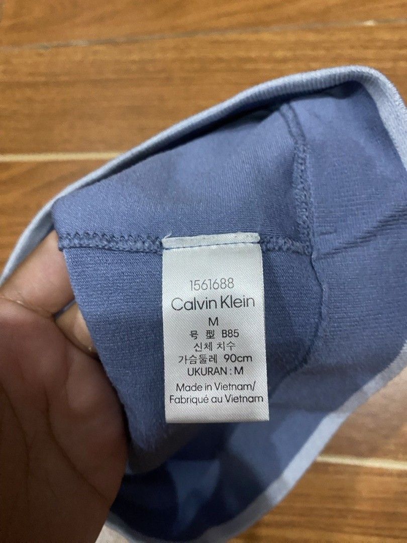 Calvin Klein Seamless Ribbed Bralette (Category: Activewear) located in Gapan. Submitted by lovelypreloved1497 (Listing ID 1469403030, Image 2). Description: Letting go of this ultra-comfortable Calvin Klein ribbed bralette in a gorgeous periwinkle / cornflower blue shade. Features a soft seamless ribbed knit structure, adjustable shoulder straps, and a secure signature knit-in Calvin Klein underband with a light blue accent stripe. Super breatha