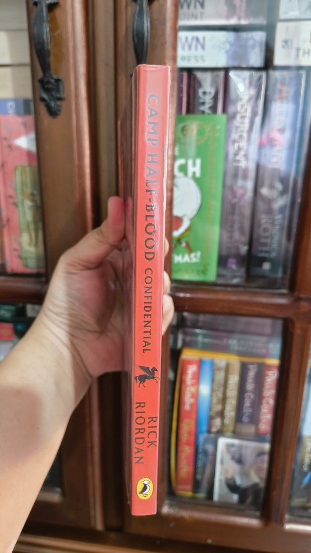 Camp Half-Blood Confidential - Rick Riordan (Category: Storybooks) located in Carmona. Submitted by wisemountain-_- (Listing ID 1469464647, Image 2). Description: - Title: Camp Half-Blood Confidential - Author: Rick Riordan - Publisher: Puffin - Format: Paperback - Condition: Clean pages, solid spine - Perfect for Percy Jackson fans and Greek mythology lovers.