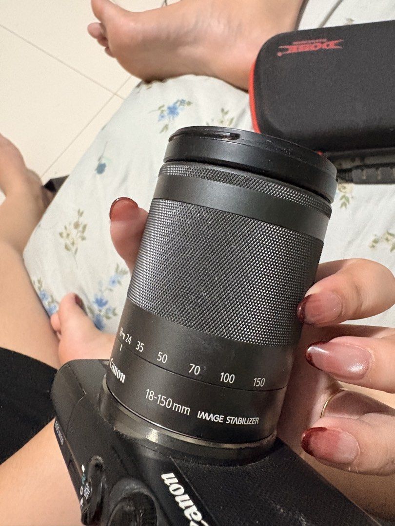 Canon EOS M100 with 18-150mm Lens (Category: Cameras) located in Cagayan de Oro. Submitted by wisebird.71bf78 (Listing ID 1469402405, Image 3). Description: - Canon EOS M100 mirrorless camera body (Black colorway) - Paired with versatile EF-M 18-150mm f/3.5-6.3 IS STM lens - Flip-up touchscreen for easy selfies and vlogging - Compact interchangeable lens design - Compatible with standard Canon EF-M mount lenses - Equipped with a standard hot shoe