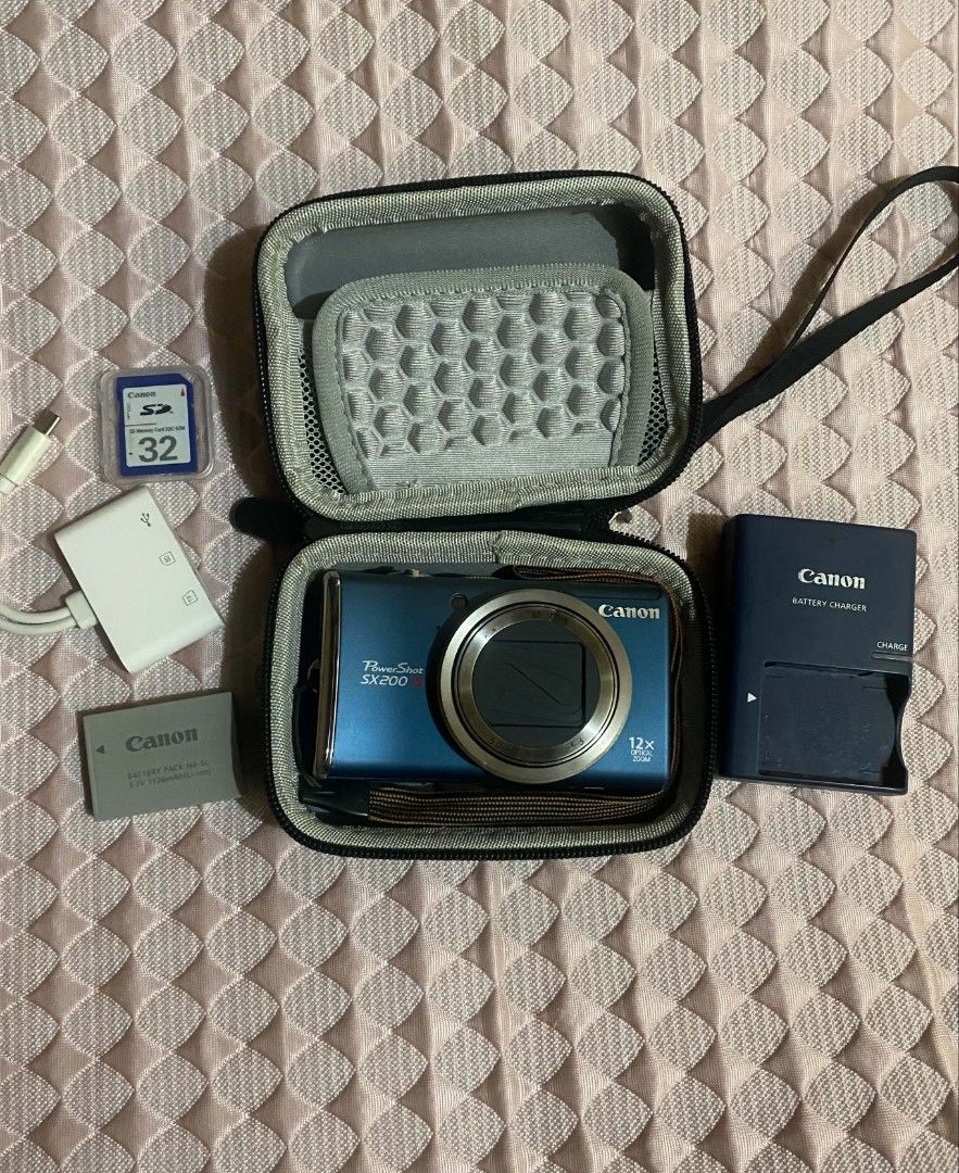 Canon PowerShot SX200 IS (Category: Cameras) located in Manila. Submitted by mystic.wisteria (Listing ID 1469477368, Image 2). Description: Canon PowerShot SX200 IS 🏷️8500 (Negotiable for sure buyers) -with pop up flash -with red light -12x optical zoom (28–336mm 35mm-film equivalent) -12.1 megapixel -Has different modes -HD Videos Issue: signs of usage only (no functional issue, fully working) Full inclusion: Camera Original Battery Original Ch