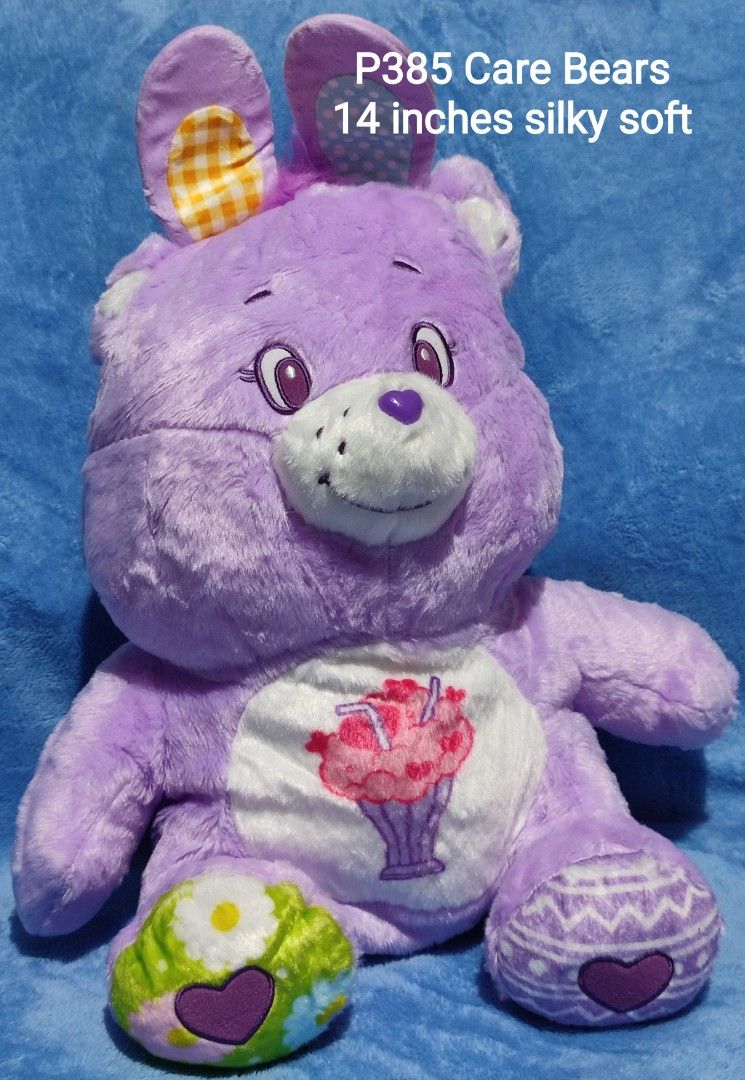 Care Bears Plush Toys Medium & Large Collection (Category: Plushies & Soft Toys) located in Baguio. Submitted by abigailmyra (Listing ID 1469512975, Image 2). Description: PHP 325 & PHP 385 each 12.5-14 inches details in the photos Care Bears brand with brand tags green & purple bears have silky smooth furs other Care Bears in another list loc: Baguio-CAR.