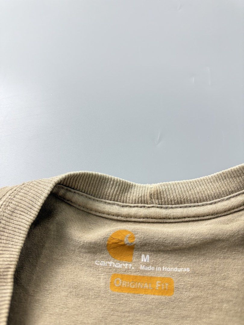 Carhartt (Category: Tshirts & Polo Shirts ) located in Pila. Submitted by villanueva80826 (Listing ID 1469533957, Image 3). Description: Carhartt pocket tee Size:large •Width:23 •Length:31 •Condition:9/10 •Color rate:9/10 Mine:780 +Shipping fee Issue:sign of usage like light discoloration not noticeable due to his color way Still in good condition Still wearable .