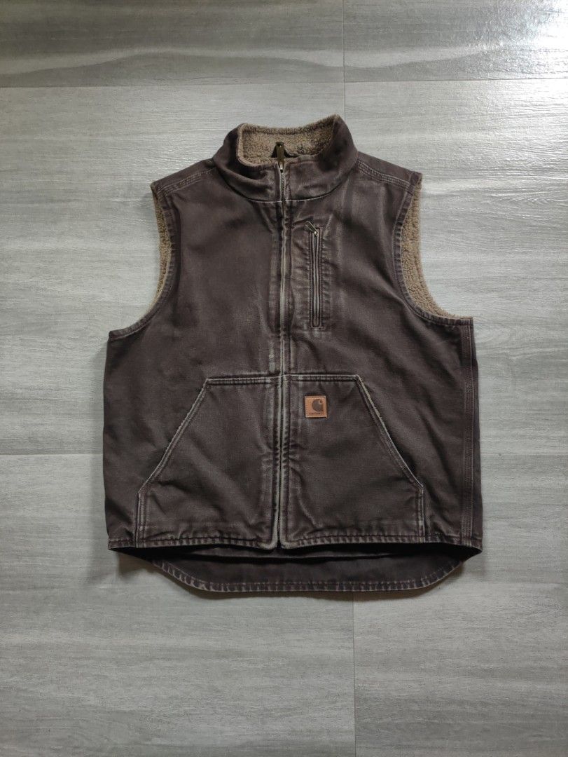 Carhartt 2017 Sherpa-Lined Canvas Vest (Category: Coats, Jackets and Outerwear) located in Calamba. Submitted by alorbis96758 (Listing ID 1469431411, Image 1). Description: Chest Width : 22" Length Front : 24" Length Back : 26" Best Fit : Medium Boxy Color Rate : 9.2 Flaws : Minimal Fade on Zipper Lining.