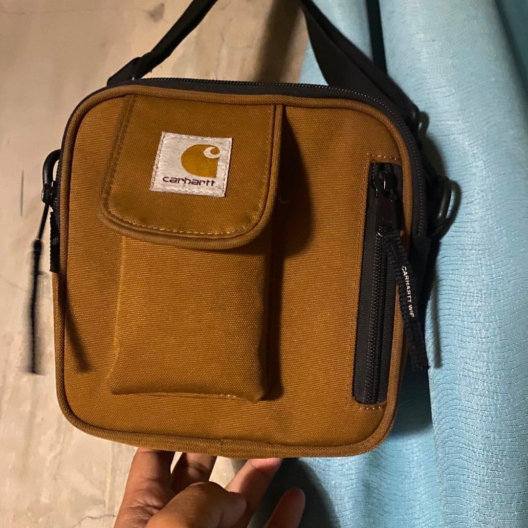 CARHARTT WIP ESSENTIAL SLINGBAG (Category: Sling Bags) located in Davao. Submitted by makmoonthriftdvo (Listing ID 1469559866, Image 1). Description: Looking for right buyer Carhartt WIP Essential Sling bag Hamilton brown Authentic As new condition DM 📩📩 DAVAO.