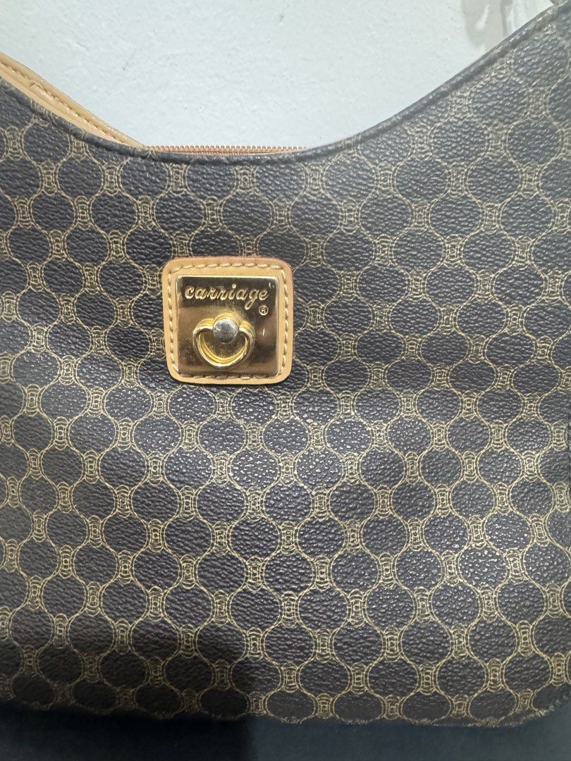 Carriage Brown Monogram Shoulder Bag (Category: Shoulder Bags) located in Imus. Submitted by budolfindsimus (Listing ID 1469503136, Image 3). Description: 🤎 CARRIAGE JAPAN HOBO BAG - MONOGRAM COLLECTION 🤎 JAPAN SOURCE / VINTAGE JAPAN BRAND Pang tita na classy! Parang Celine ang pattern - pero mas abot kaya! 😍 DETAILS: Brand: CARRIAGE ® - Japan Brand 🇯🇵 Origin: Japan Source / Japan Ukay Style: Hobo / kilikili Bag Material: Signature Monogram 