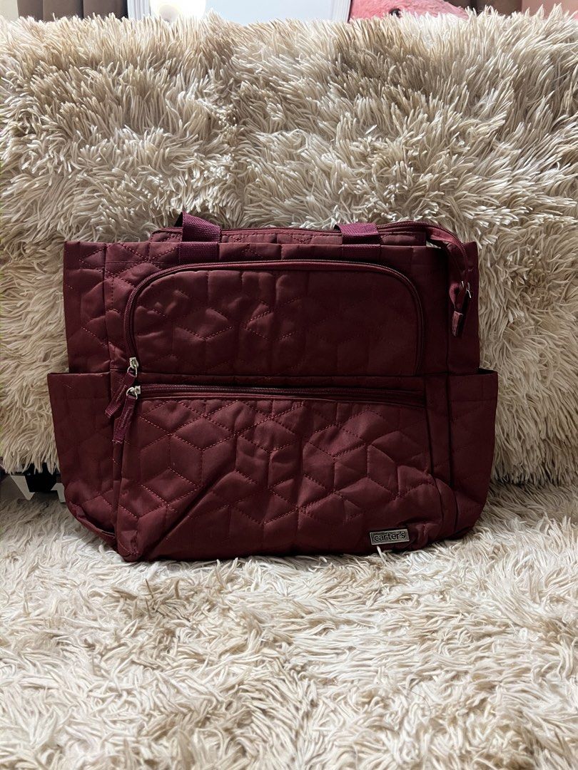 Carter's Maroon Baby Diaper Bag (Category: Tote Bags) located in Manila. Submitted by edrrye (Listing ID 1469428347, Image 2). Description: •Excellent condition •No visible flaws •Clean and well-kept Still looks nice and presentable! Perfect for moms looking for a practical baby bag.🧸.
