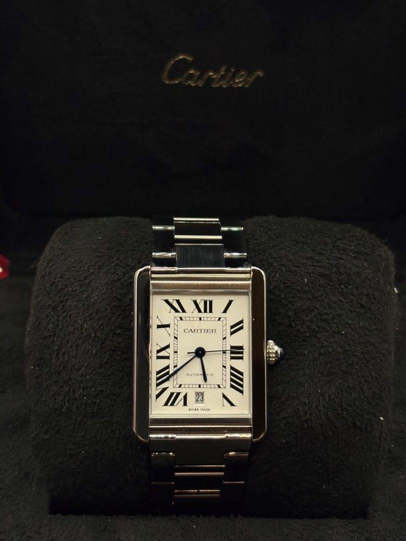 Cartier Tank XL 2015 model (Category: Women's Watches) located in Manila. Submitted by ams.777 (Listing ID 1469510989, Image 1). Description: Cartier Tank XL White roman dial 39.8mm x 47.5mm Stainless steel W5200028 2015 year model 9.8/10 Complete set Open for authentication Price negotiable.