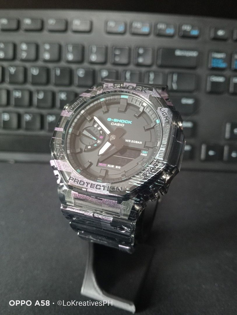 Gshock GA-2100NN-1A (Category: Men's Watches) located in Cavite. Submitted by purpose_served (Listing ID 1469570344, Image 1). Description: GA-2100NN ANALOG-DIGITAL 2100 Series GA-2100NN-1A Part of the "Digital Glitch" special series Basic Information Price: MSRP ₱10,000 +++ Case size: 48.5 × 45.4 × 11.8 mm Weight: 51 g Case: Carbon Core Band: Transparent Shock Resistant 200-meter water resistance Mineral Glass Neobrite Things to know: - Gifted t